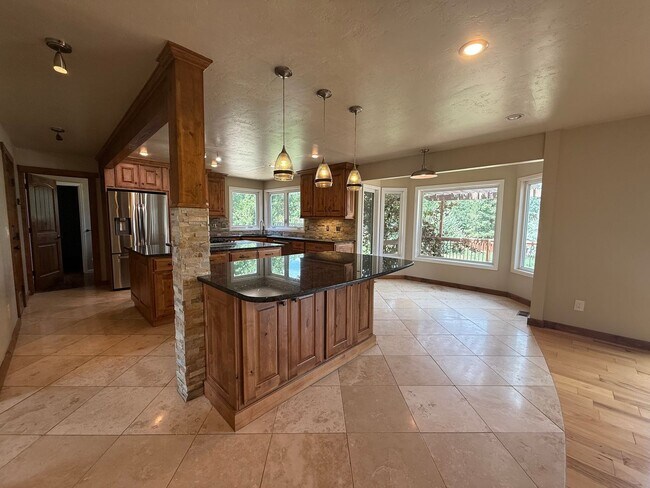Building Photo - 5BD/4BA/3 car garage w Flat Yard Cheyenne ...