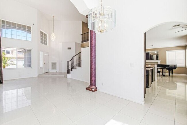 Building Photo - Spacious 4-Bedroom Home with Fireplace, 3-Car Garage & Great Backyard