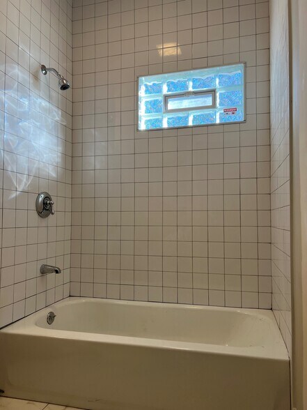 One of 2 tiled bathrooms - 56 State St