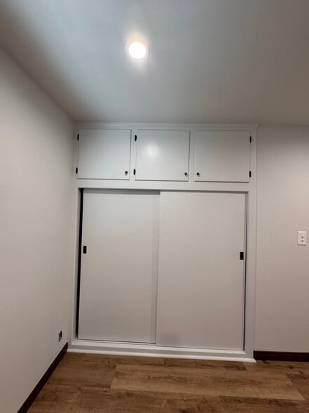 Bedroom closet and upper storsge - 1016 Western Ave