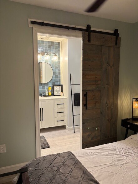 Entrance to your private ensuite with barndoor - 15 Brandywine Dr