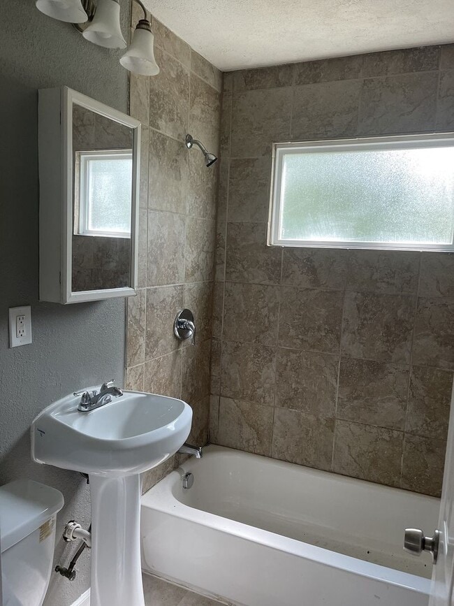 Building Photo - COMING SOON: Bright 3-Bed Home with Spacio...