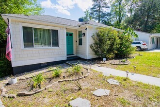 Building Photo - Adorable 3BR Rosewood Rental with Dreamy P...