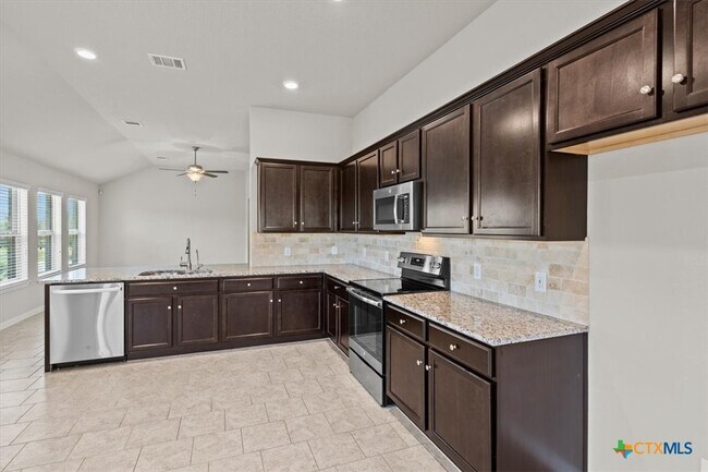 Building Photo - 5642 Meadow Sky