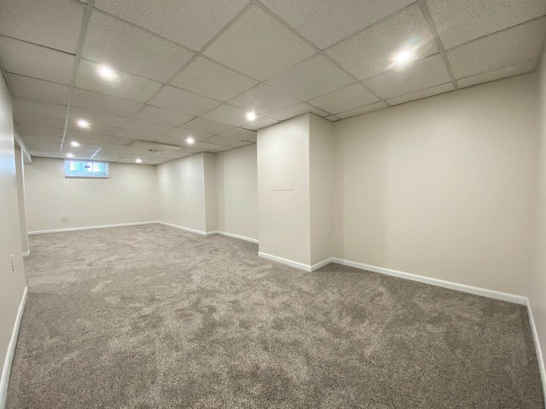 Finished Basement - Additional flex space, ideal for office, gym, or storage - 710 Sheridan Avenue North