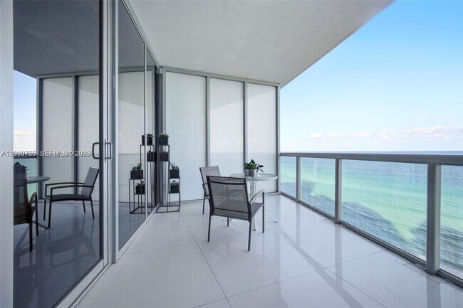 Building Photo - 17121 Collins Ave