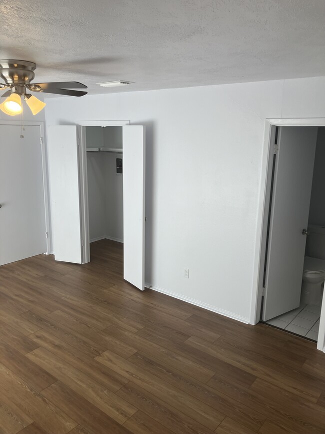 View of the master toward the master bath and walk in closet. - 13559 Red Fern Ln