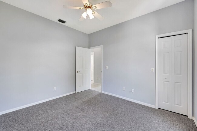 Building Photo - A BOATER'S PARADISE WITH THIS STUNNING 3 BEDROOM, 2 BATH WATERFRONT POOL HOME W/DOCK & BOAT LIFT ...