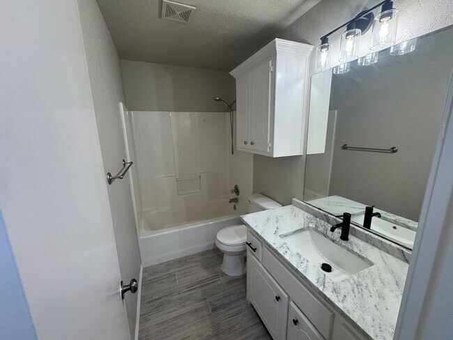 Building Photo - Storm Shelter!!! This 3 bed, 2 bath, 2 Car Garage home has new paint, kitchen and bathroom granit...