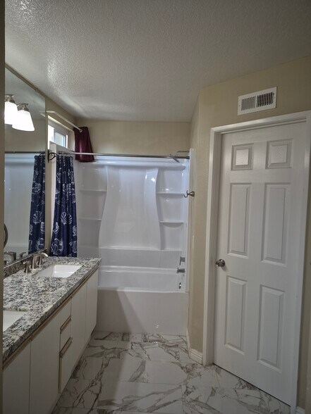 Master bathroom with new bathtub - 1186 S Country Glen Way