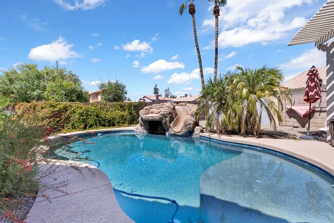 Building Photo - Beautiful 5-Bedroom Home with Private Pool...