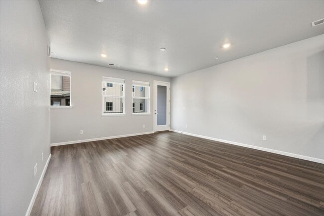 Building Photo - Gorgeous NEW Three Story Townhome with two car attached garage!