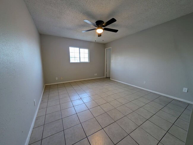 Building Photo - 4-bedroom house with a 2-car garage availa...