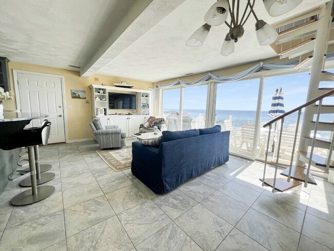 Building Photo - WINTER RENTAL Beach-front condo September ...