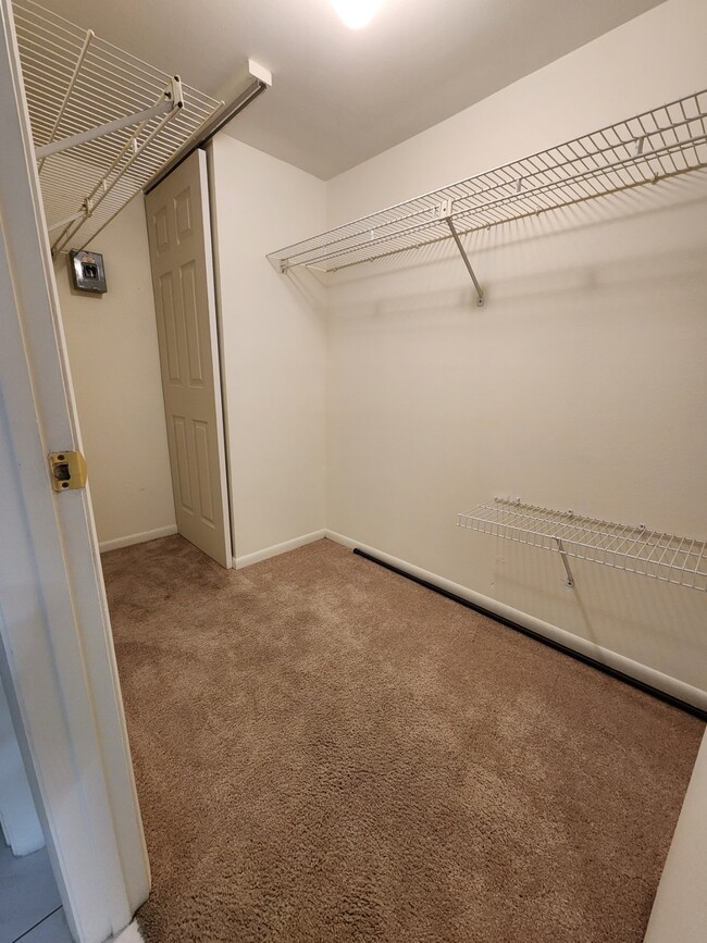 Walk-in master closet - 15075 Parkside Dr