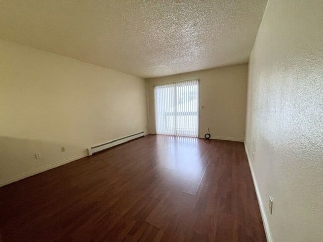 Building Photo - East Anchorage Condo with Laminate Floorin...