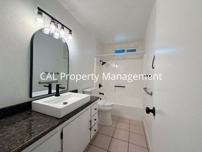 Building Photo - Spacious 4-Bedroom Home with 2-Car Garage & Backyard Oasis