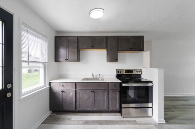 Building Photo - Available in June! 4-Bedroom Townhouse in Scenic Hills Homes - Midland, PA