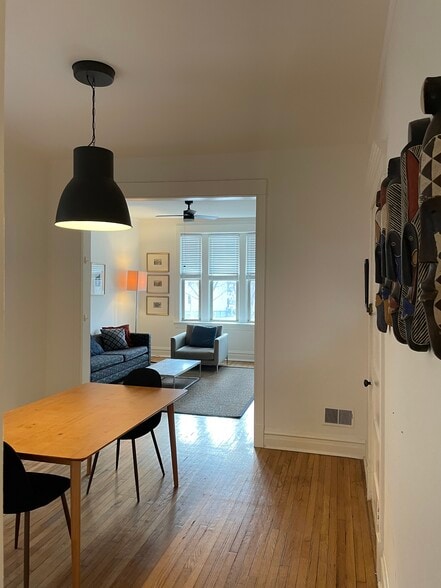 Dining room with chairs and table - 3489 N Elston Ave
