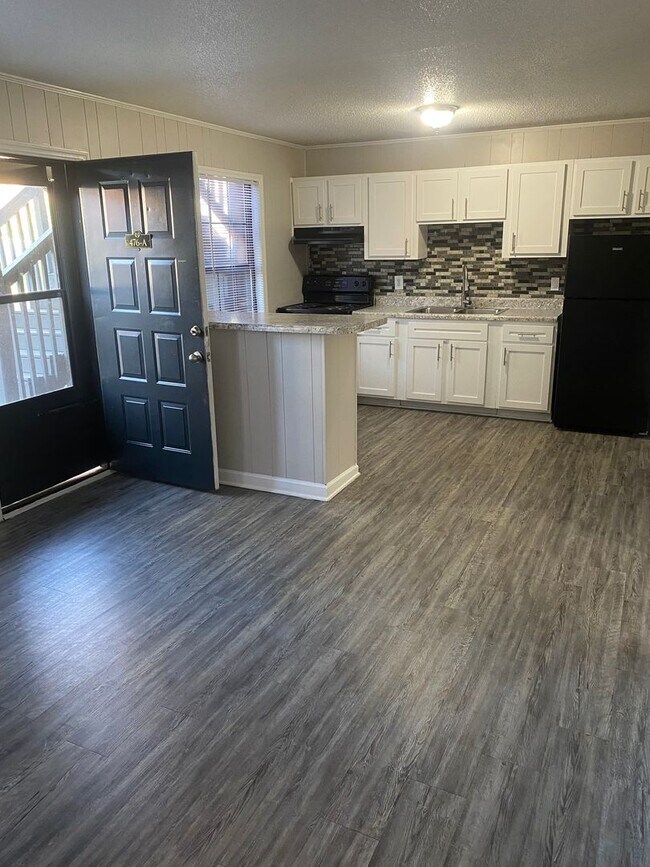 Building Photo - May Savings Are Here! Application Fee WAIVED ALL month!