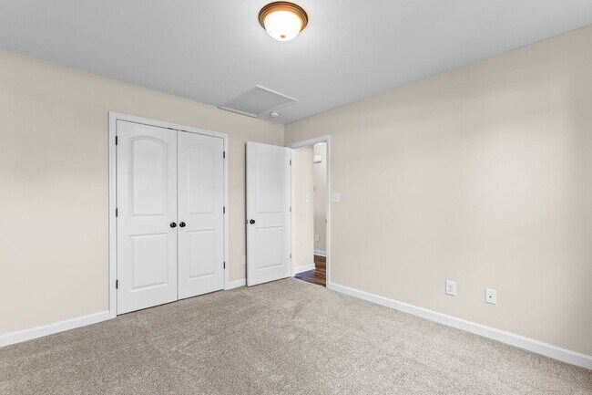 Building Photo - Spacious Home with Natural Light