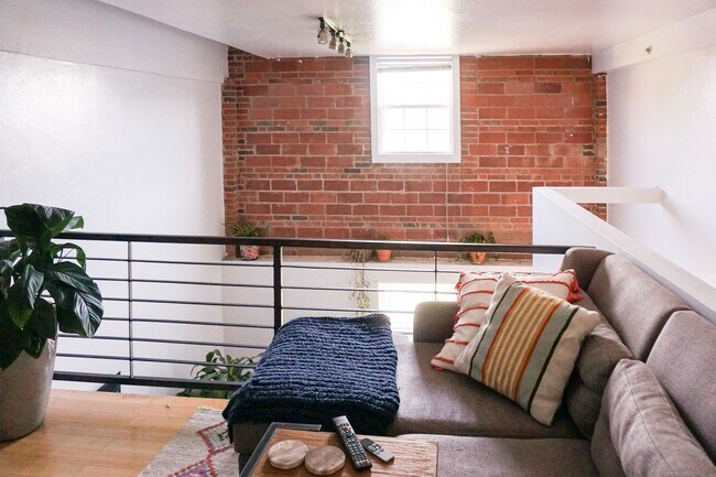 loft area- window has view of downtown skyline - 1213 N Harvey Ave