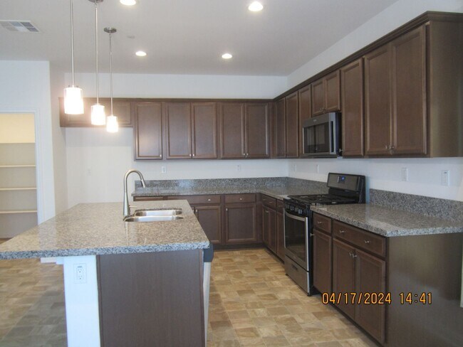 Building Photo - COOL POOL, PARKS AND NEAR NEW 3 BR PLUS DEN IN MEINFEE