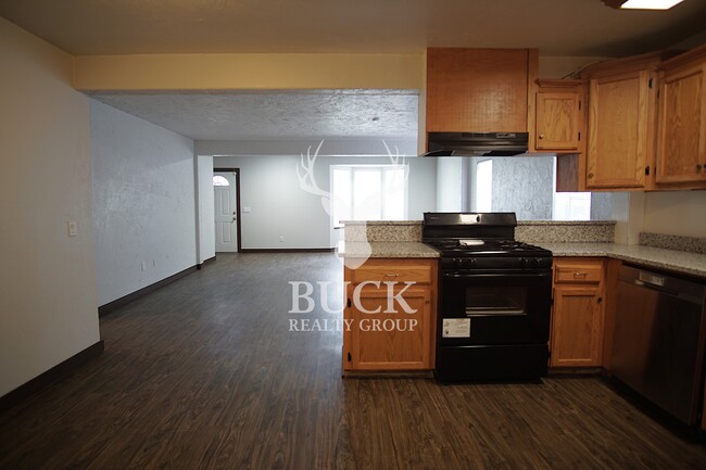 Building Photo - 211 E Harmon Dr