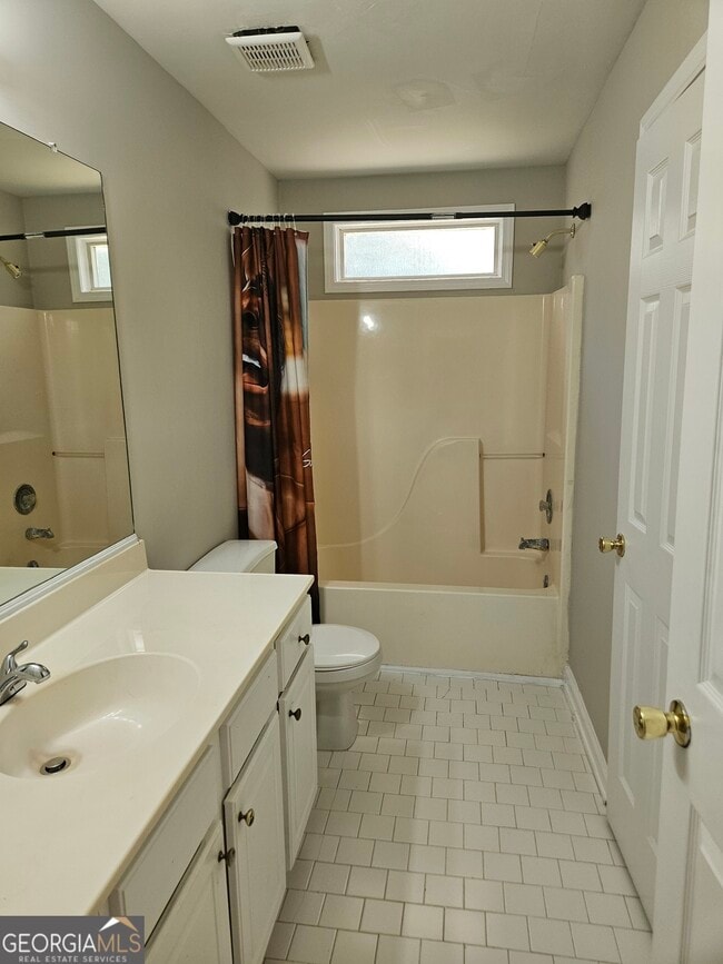 Building Photo - 6865 Breeze Dr