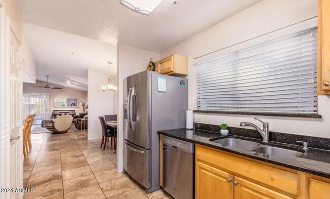 Building Photo - 8813 E Charter Oak Dr