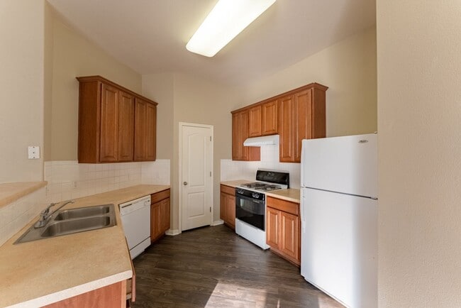 Building Photo - Charming Brick Home with Open Floorplan, Vaulted Ceilings, and Luxurious Amenities—Perfect for An...