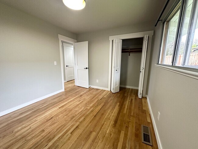 Building Photo - 1/2 Month Free! Sun-Filled 3-Bedroom Ranch with Wood Flooring, A/C, Updated Kitchen & 2-Car Garage!