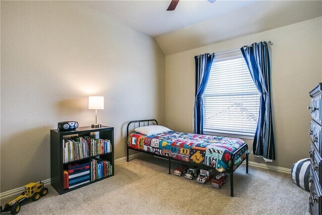 Building Photo - Immaculate home on a beautifully landscaped lot, tandem garage, plenty of storage!