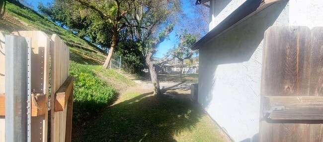 Building Photo - Charming 2BR Retreat with Private Patio, Scenic Views & Resort-Style Amenities