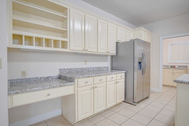 Building Photo - Festive Move-In Special! 4BR/3BA Lenox Gem – Fully Fenced Backyard & Military ½ Deposit