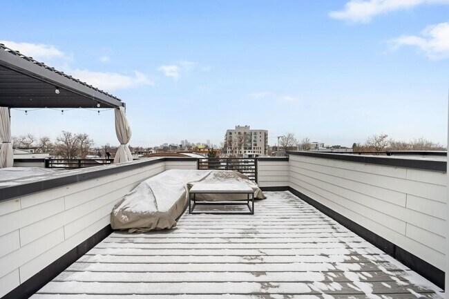 Building Photo - Modern 2-Bedroom Rowhome with Rooftop Moun...