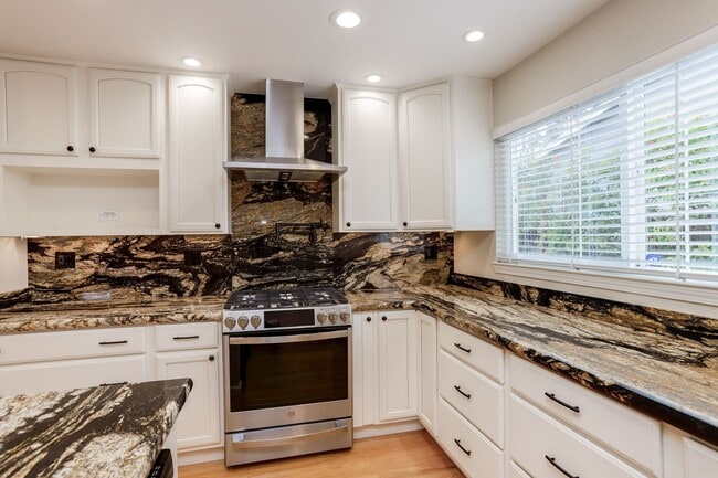 Building Photo - 4BR/3.5BA Belmont Home with Multiple Ensuite Bedrooms, A/C & 2-Car Garage | YouTube Tour