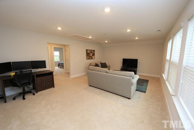 Building Photo - Main Floor Owner's Suite PLUS Main Floor G...