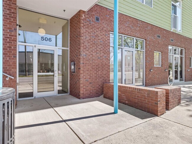 Building Photo - Downtown Durham 1bd/1ba Corner-Unit Condo with On-Site Personal 1-Car Garage!