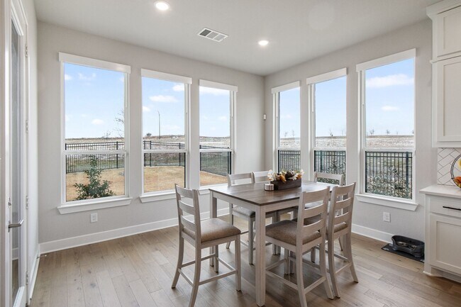 Building Photo - Stunning 4-Bedroom Luxury Residence with Bonus Office in the Prestigious Walsh Community LIKE NEW!