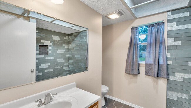 Building Photo - 1307 S 77th E Ave