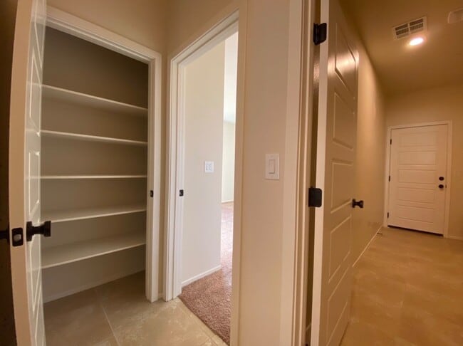 Building Photo - 4 BED 3 BATH Townhome, 1 LOFT, 2 GARAGES, GATED!