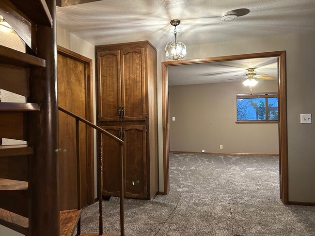 Building Photo - 6367 Woodman Dr