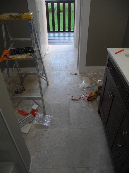 Travertine flooring - 1934 Henderson Ave