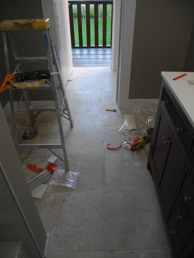 Travertine flooring - 1934 Henderson Ave