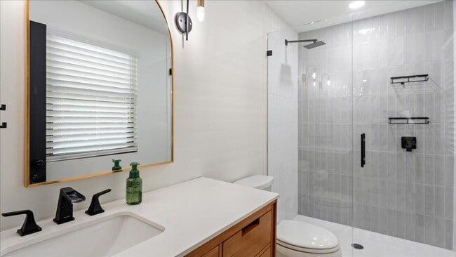 Building Photo - Renovated Mid-Century Modern Home in Belmont West with Finished Basement & Fenced Yard