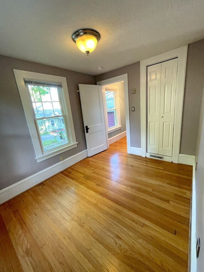Building Photo - Spacious 3-Bedroom Near U-M Athletic Campus with Parking + Yard