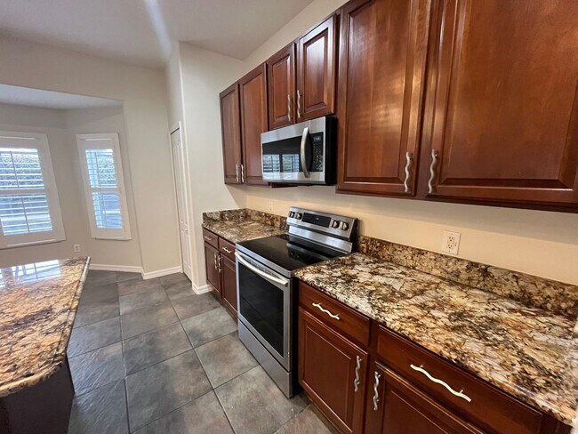 Building Photo - Corner Lot, 4 Bedroom Home with Pool at No...