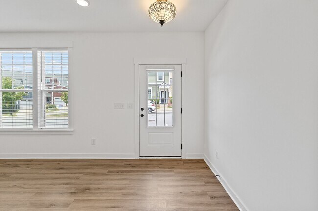 Building Photo - 3 Bedroom Townhome with Rooftop Terrace in Downtown Wake Forest!