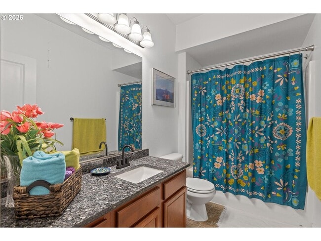 Building Photo - Spacious 3 Bedroom Townhome with Stainless Steel Appliances, Attached Garage & Open Layout